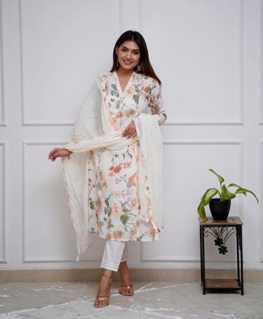 white-color-kurti-suit-set-seems-to-be-a-party-wear-outfit-made-from-maslin-fabric-with-nazmin-duptta3-pair-big-3