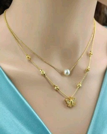 gold-plated-american-diamond-necklace-and-white-parl-combo-set-big-0